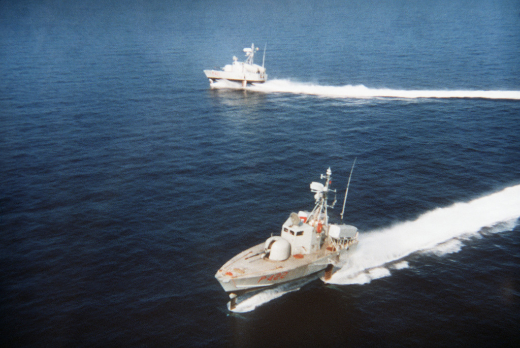 Aerial port side view of the Italian Sparviero class hydrofoil-missile NIBBIO P-421) and FALCONE (P-422) underway - U.S. National Archives &amp; DVIDS Public Domain Search